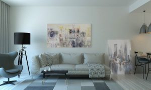 Image is a well designed neutral living room in a rental unit.