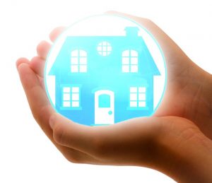 Image is an illustration of a house sitting in a protective bubble in someone's hands. Image is an illustration of a house sitting in a protective bubble in someone's hands.